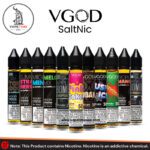 The image shows a lineup of VGOD SaltNic e-liquids in various flavors, including "Mango Bomb," "Pink Cake," and "Lush Ice," with sleek black caps and colorful labels. The VapeTime UAE logo is at the top left, and a nicotine warning is displayed at the bottom, stating "This Product contains Nicotine. Nicotine is an addictive chemical.