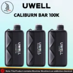 Three UWELL Caliburn Bar 100K disposable vapes in black carbon fiber design showing Strawberry Watermelon, Watermelon Ice, and Love 66 flavors, available at Vape Time UAE in Dubai