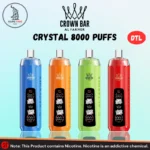 Al Fakher Crown Bar Crystal 8000 Puffs disposable vapes displayed side by side in blue, orange, green, and red colors, featuring a DTL dual-mode screen on each device.